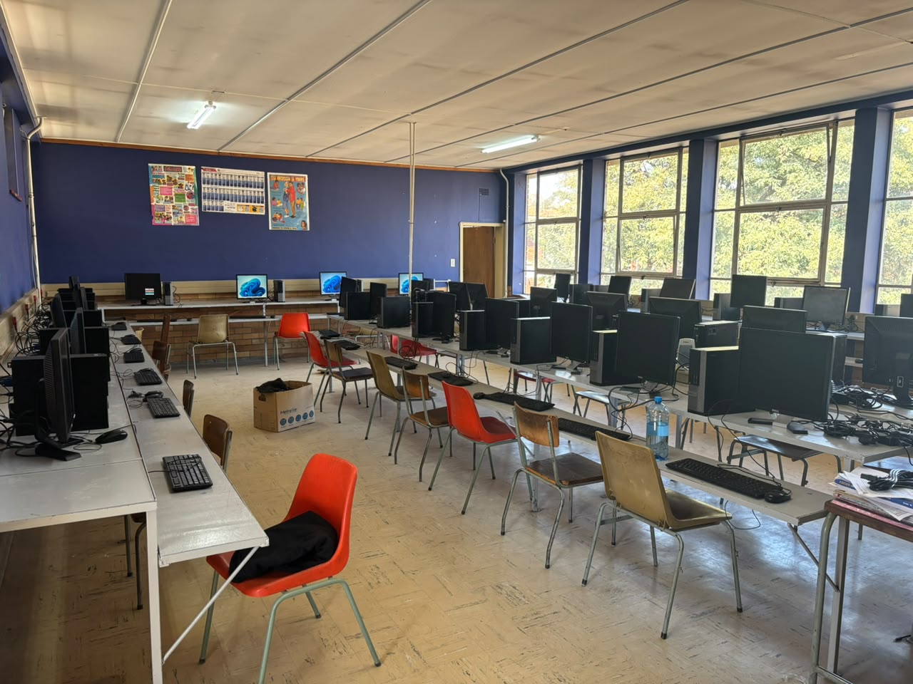 Completed computer lab setup with desktop computers installed
